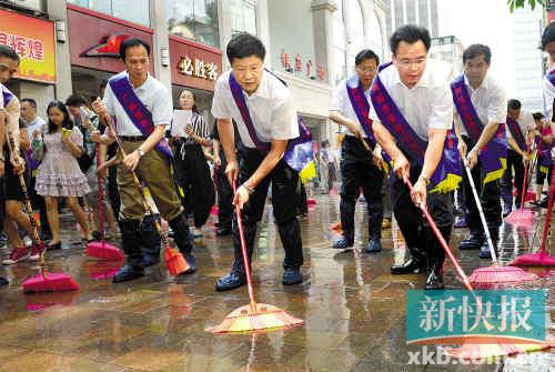 “我志愿,我快乐”保洁广州 市长上街扫马路