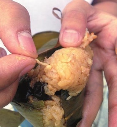 北京美廉美散装粽子现肉虫：消费者获50元赔偿